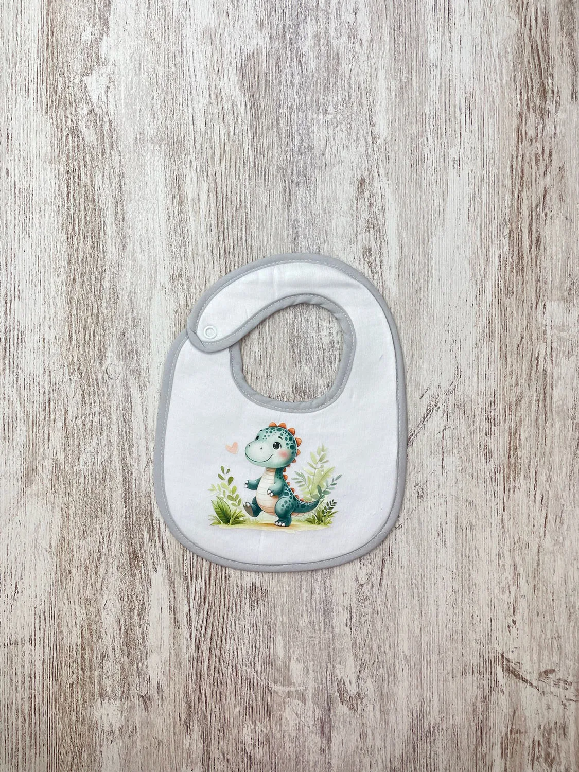 Babete Impermeável Dino