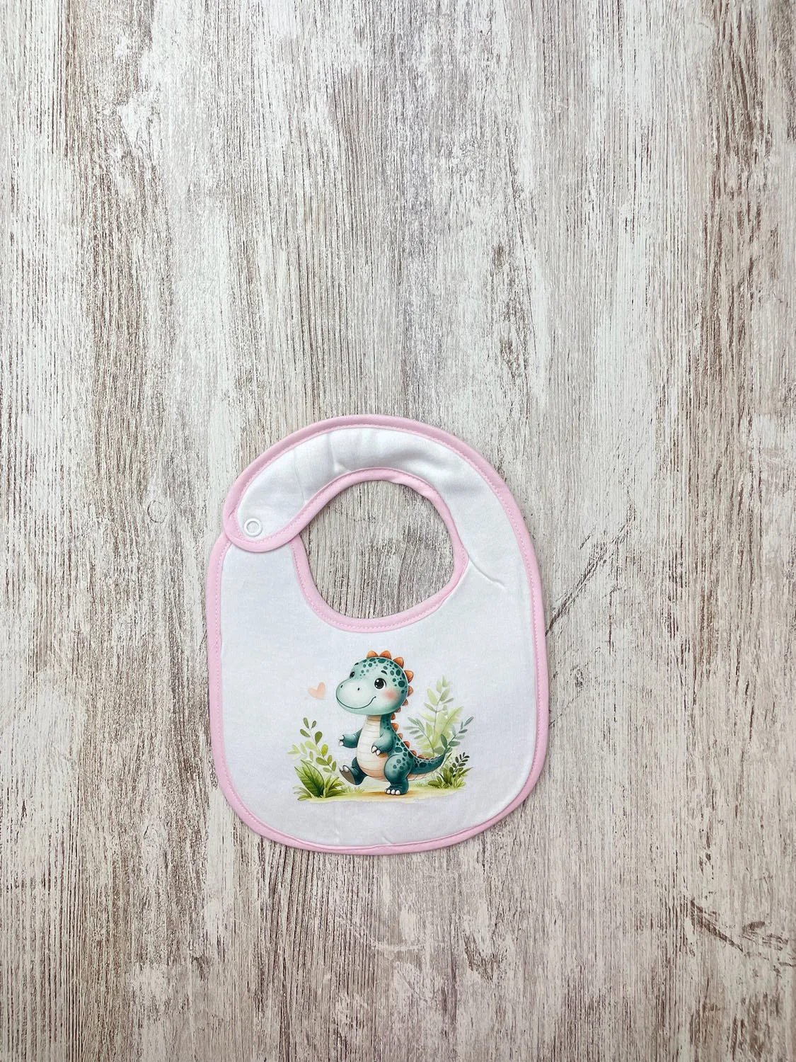 Babete Impermeável Dino